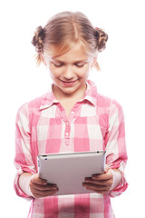 Pretty little girl with a Tablet PC 