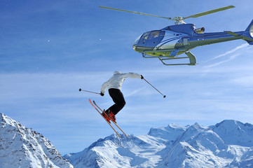 ski jumper being filmed from a helicopter © camerawithlegs