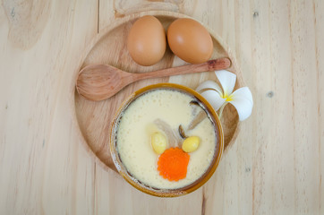 steamed egg on wood background