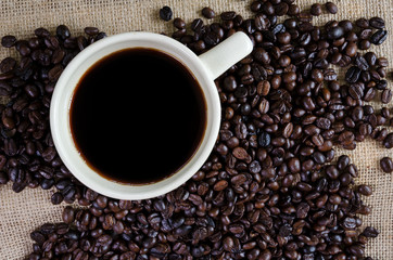 Fototapeta premium Hot dark coffee and coffee beans