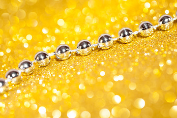 Decorative gold background with sparkling