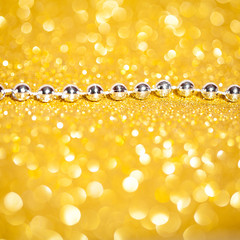 Decorative gold background with sparkling
