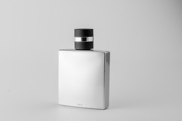 Men perfume bottle, gray. Isolated on white background.