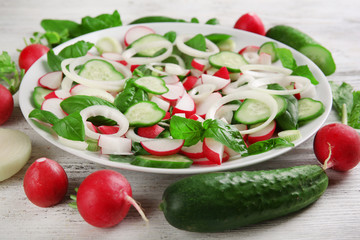 Fresh vegetable salad on table close up