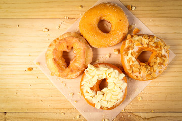 Donuts on wooden background