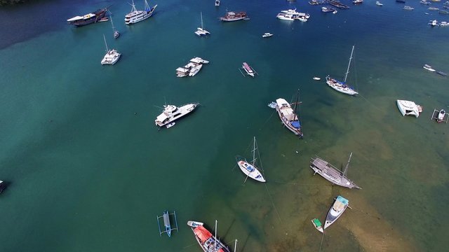 Aerial view of yahts in bay. Summer time.