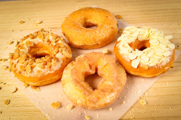Donuts on wooden background