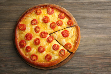 Pizza Margherita and removed slice on table
