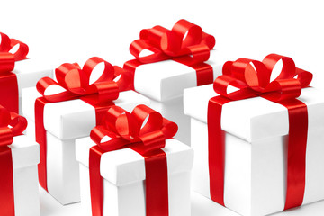 White gift box with red ribbon bow