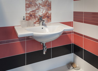 detail of beautiful and stylish bathroom with floral motif