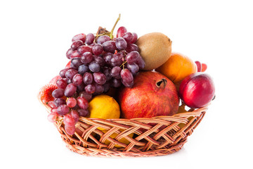 Fruits  in the basket. assorted fruits in wicker basket