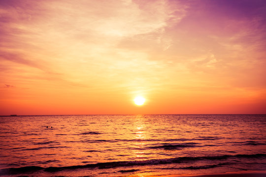 sunset and beach. Beautiful sunset above the sea © EwaStudio