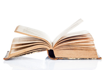 Old book open isolated on white background