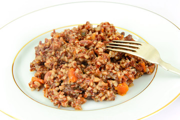 Fototapeta premium Healthy Food: Pilaf with Meat and Red Rice.