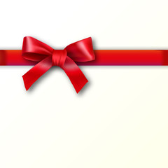 Red ribbon with bow on a white background