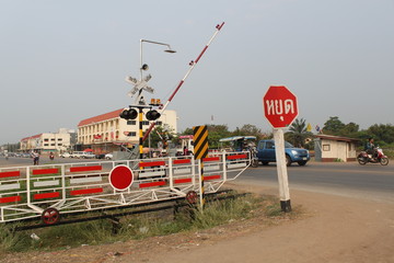 railroad crossing with a barrier