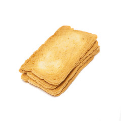 thin rusks pile over white background