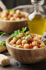 Vegeterian cooked chickpea with tomato and parsley