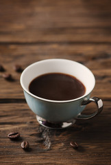 Cup of italian stong coffee espresso on the vintage table