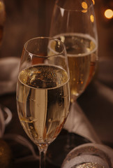 Glasses of champagne on the christmas background