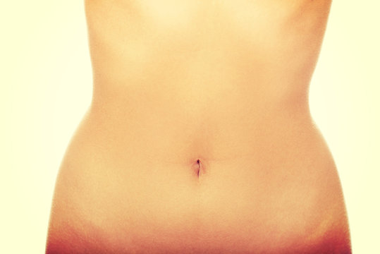 Woman's slim belly.