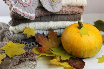 stack of sweaters knitted autumn concept