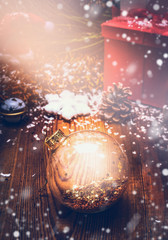 Shine Christmas card with glass ball, stars and snow. Retro style