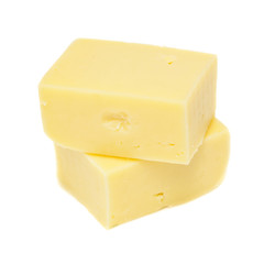 edam cheese blocks on white background