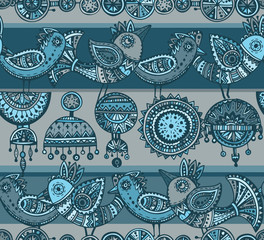 Seamless pattern with hand drawn fancy birds in ethnic style 