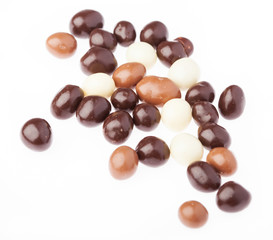 variety small chocolate balls isolated on a white background