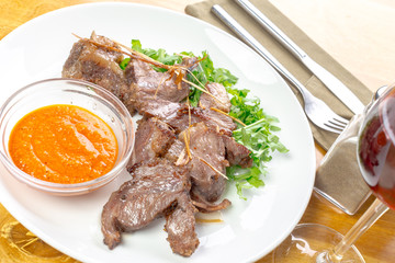 Beef slices with sauce