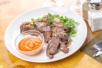 Beef slices with sauce