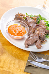 Beef slices with sauce