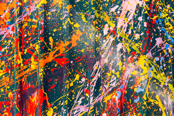 Fototapeta premium Abstract, Colorful Paint Splash on a green background.