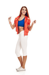 Happy young woman with slim body posing