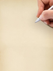 Hand writing on old grungy blank sheet of paper.