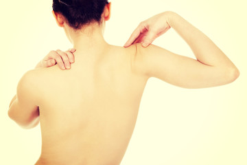Naklejka premium Naked woman's spine.