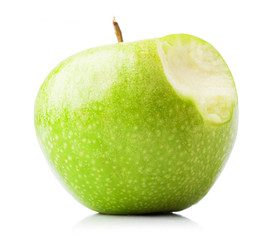 bitten green apple isolated on a white background