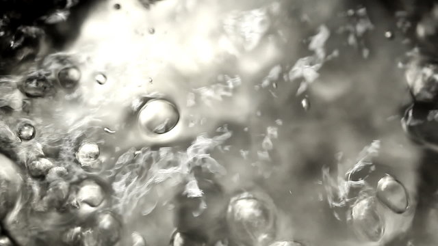 clean boiling water in a pan close-up
