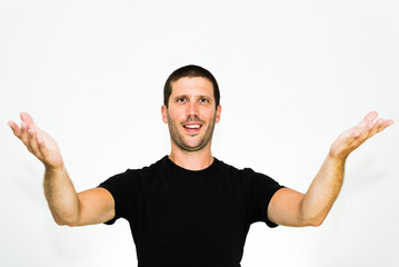 You are welcome! Close-up of young caucasian man smiling with arms up - isolated on white background