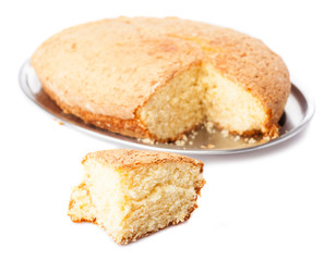one piece of sponge cake isolated on a white background