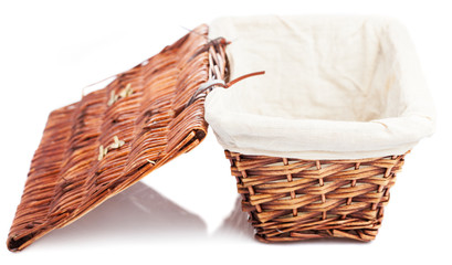 Obraz premium wicker basket isolated on a white background