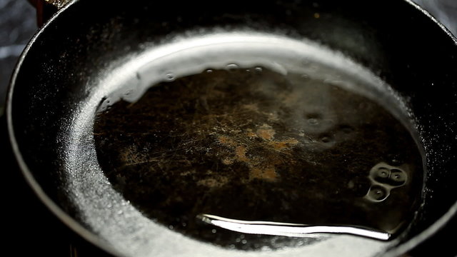 sunflower oil poured into a red-hot frying pan