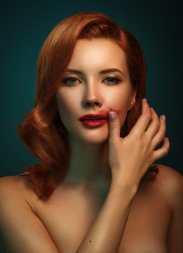 Beautiful woman. Portrait of young caucasian redhead female, red