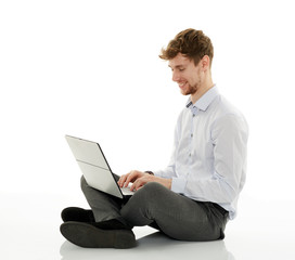 Businessman with laptop on white background