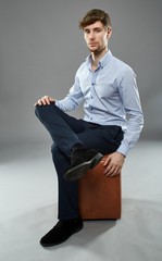 Businessman on a chair portrait