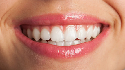 perfect smile with red lips, extreme closeup