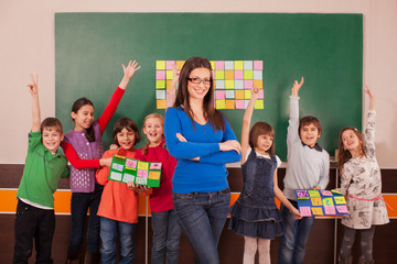 Children in elementary school with their teacher