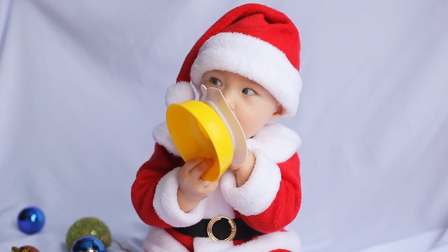 Little Santa Claus on a white background