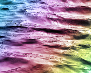 Beautiful waters with soft ripples on surface in Rainbow colors
